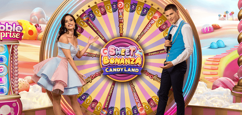 Sweet Bonanza CandyLand Προωθητική εικόνα του Sweet Bonanza CandyLand με δύο παρουσιαστές και πολύχρωμο candy-themed wheel.