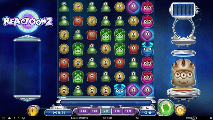 Reactoonz – στιγμιότυπο παιχνιδιού Στιγμιότυπο του Reactoonz με πλέγμα 7×7 και πολύχρωμα εξωγήινα σύμβολα