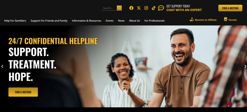 Group meeting illustrating the 800-GAMBLER 24/7 confidential helpline support.