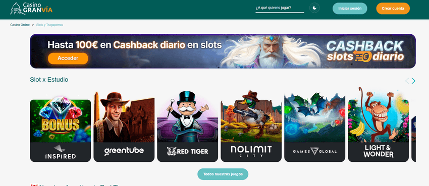 Casino Gran Vía slots por proveedor Captura de pantalla de la sección de tragaperras de Casino Gran Vía online, donde se observa el banner promocional de Cashback diario hasta 100 € en slots y el menú de filtrado "Slot x Estudio" con proveedores como Greentube, Red Tiger, Nolimit City, Games Global y Light & Wonder.